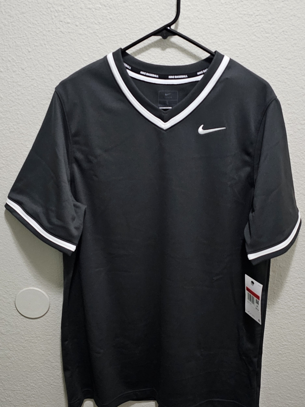 Nike Men’s Black Short-Sleeve V-Neck Shirt with White Trim